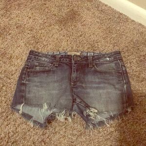 Denim cutoffs. Medium wash